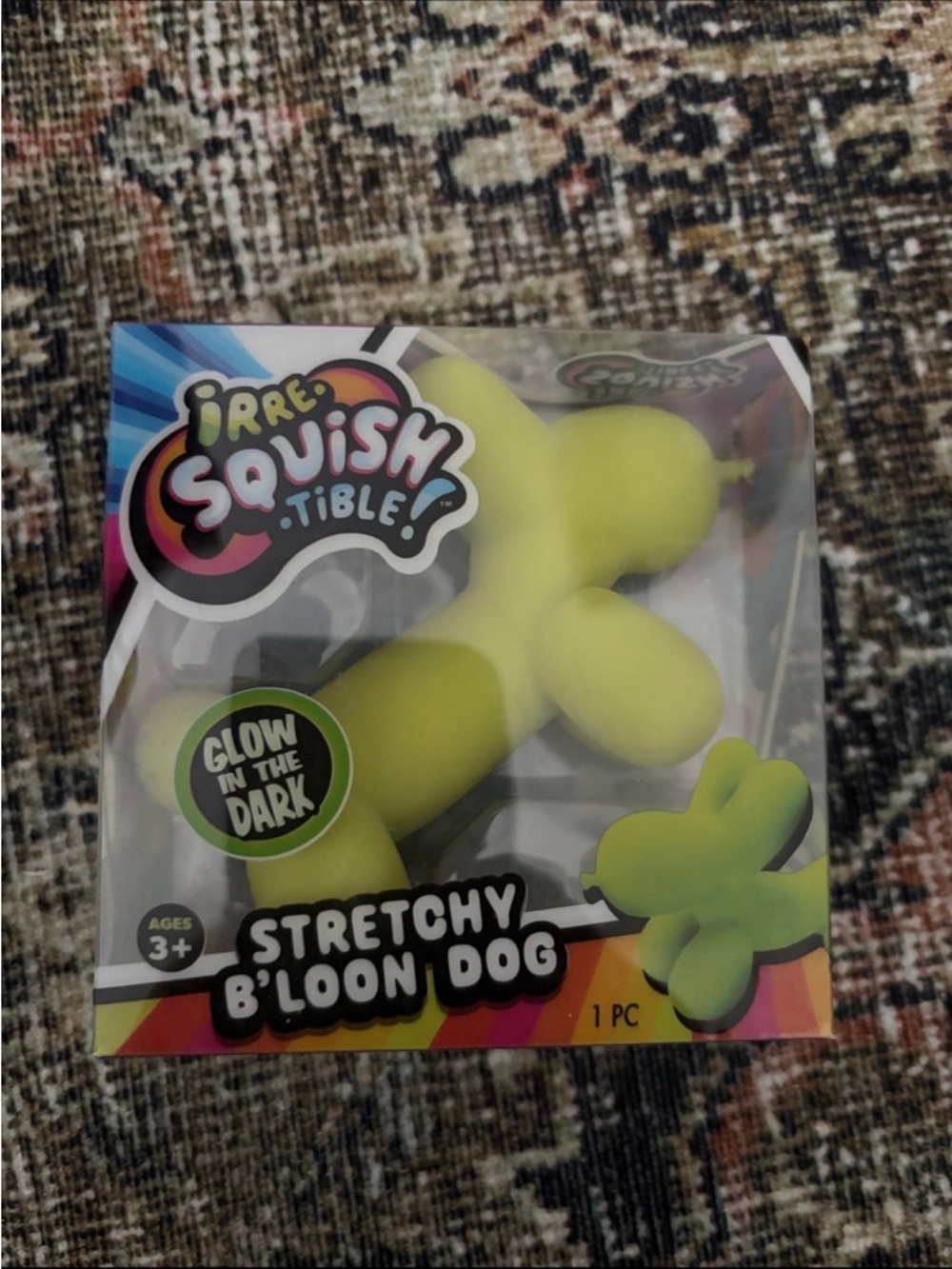 Irre-squish-able Neon glow in the dark green balloon dog.